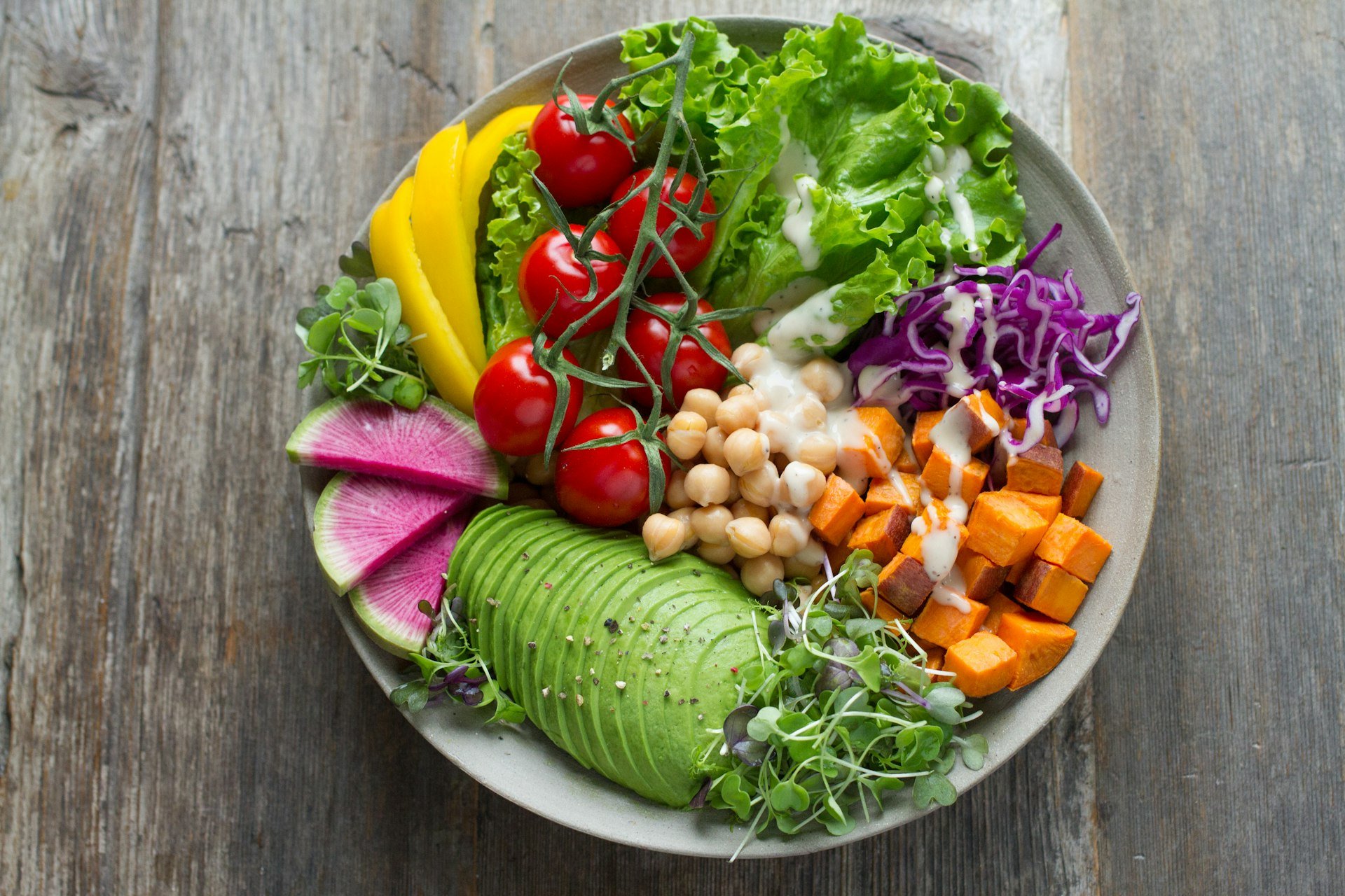 A bowl of fresh salad with vegetables