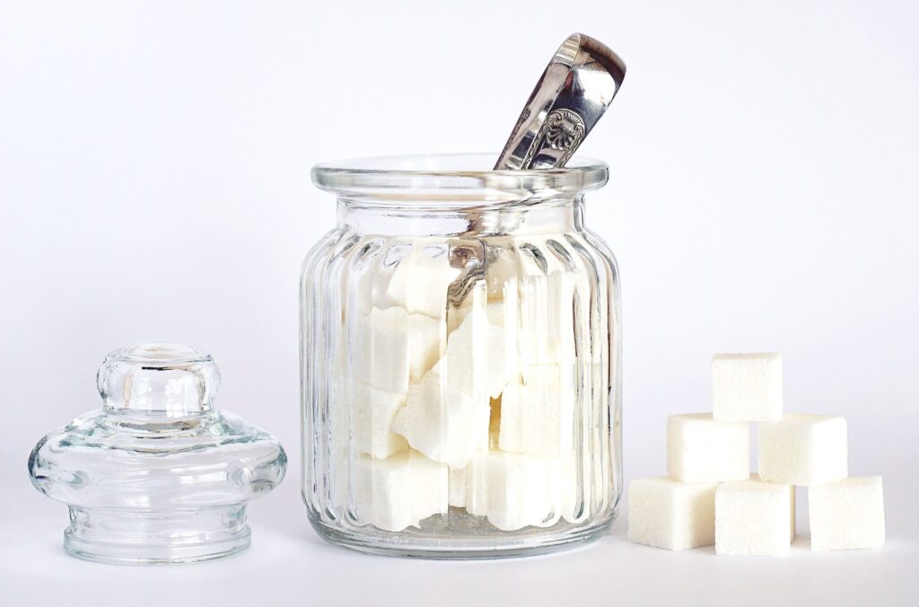 Close-up of sugar cubes in a glass jar