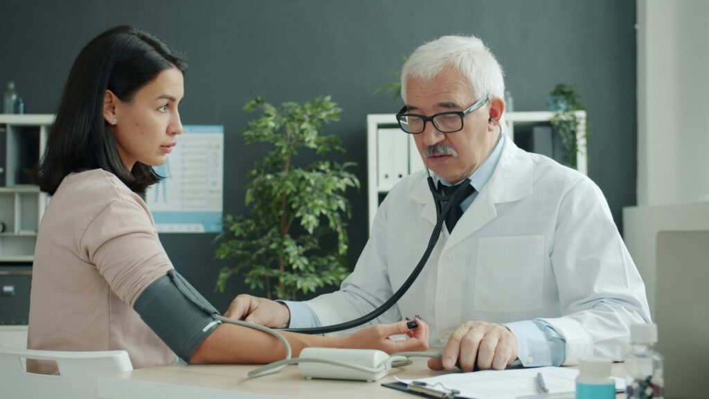 Doctor and patient during a clinical consultation