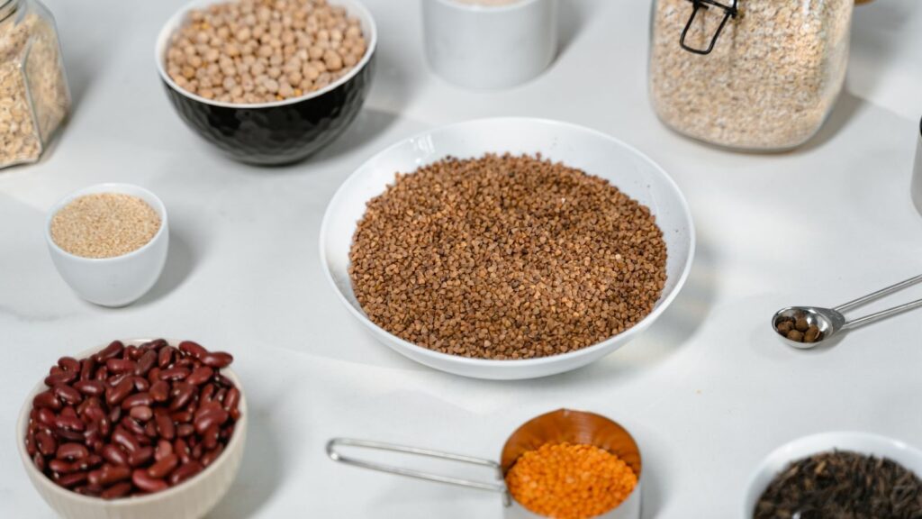 Bowls of grains and beans on a table